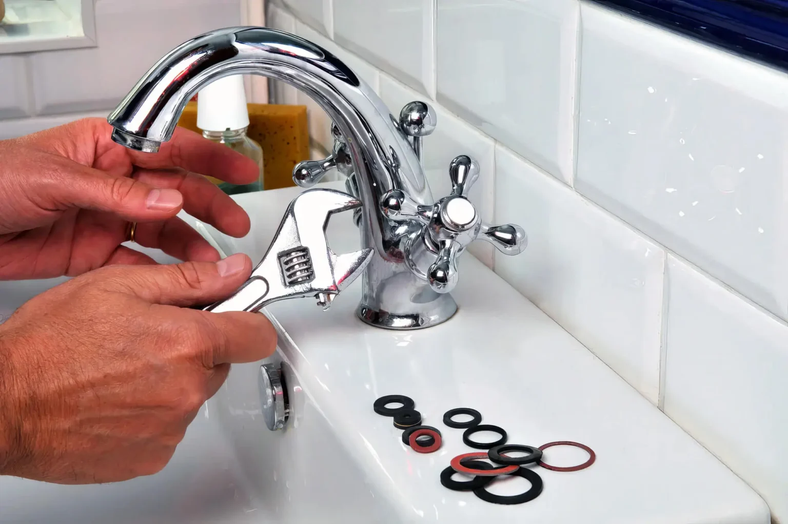 Plumber maintaining a bathroom faucet in Cerritos